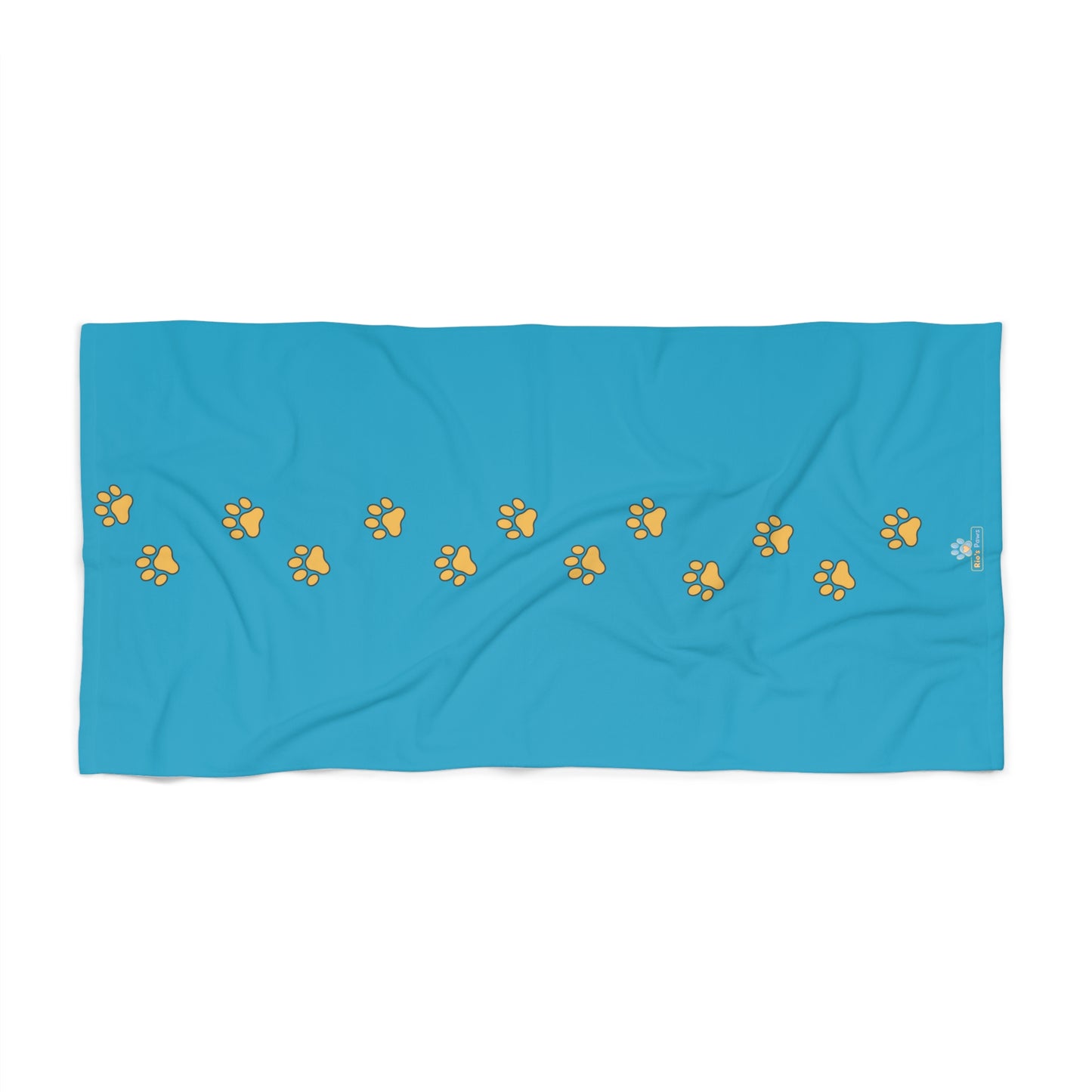 Blue towel with yellow paw prints