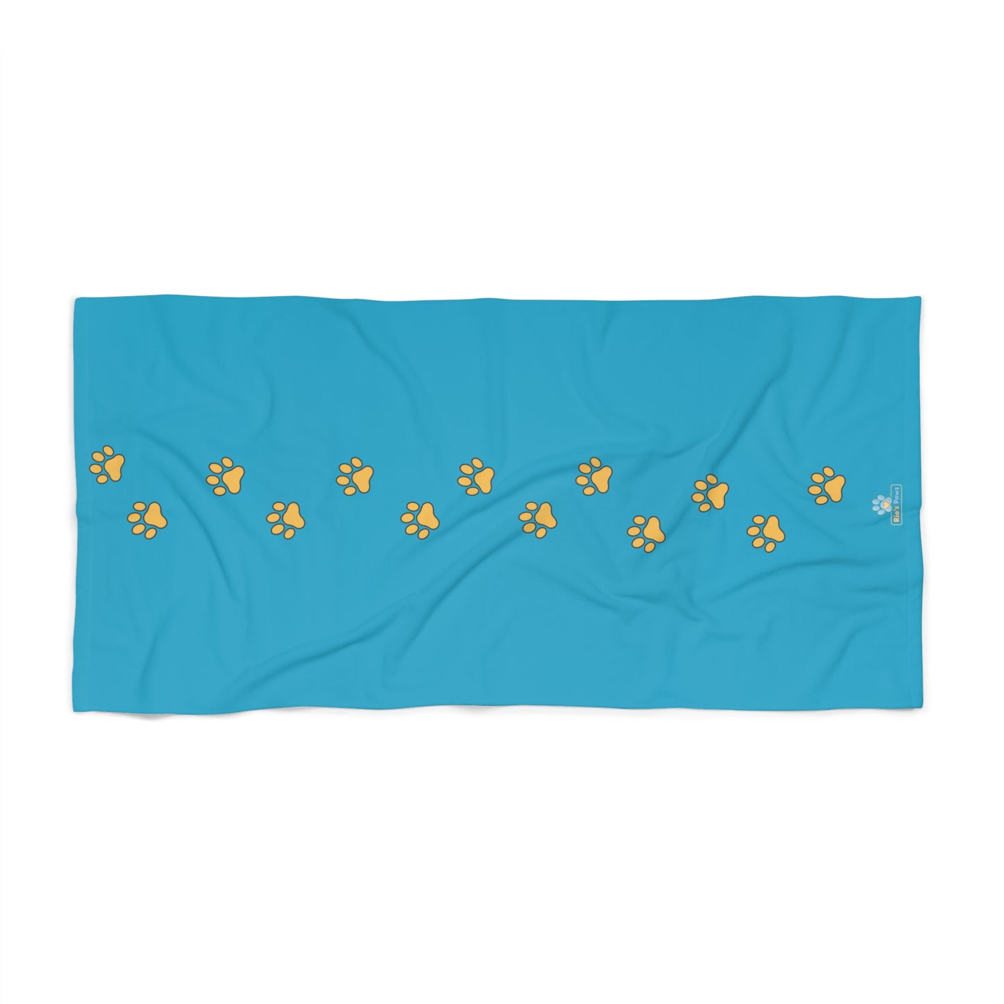 Blue towel with yellow paw prints 